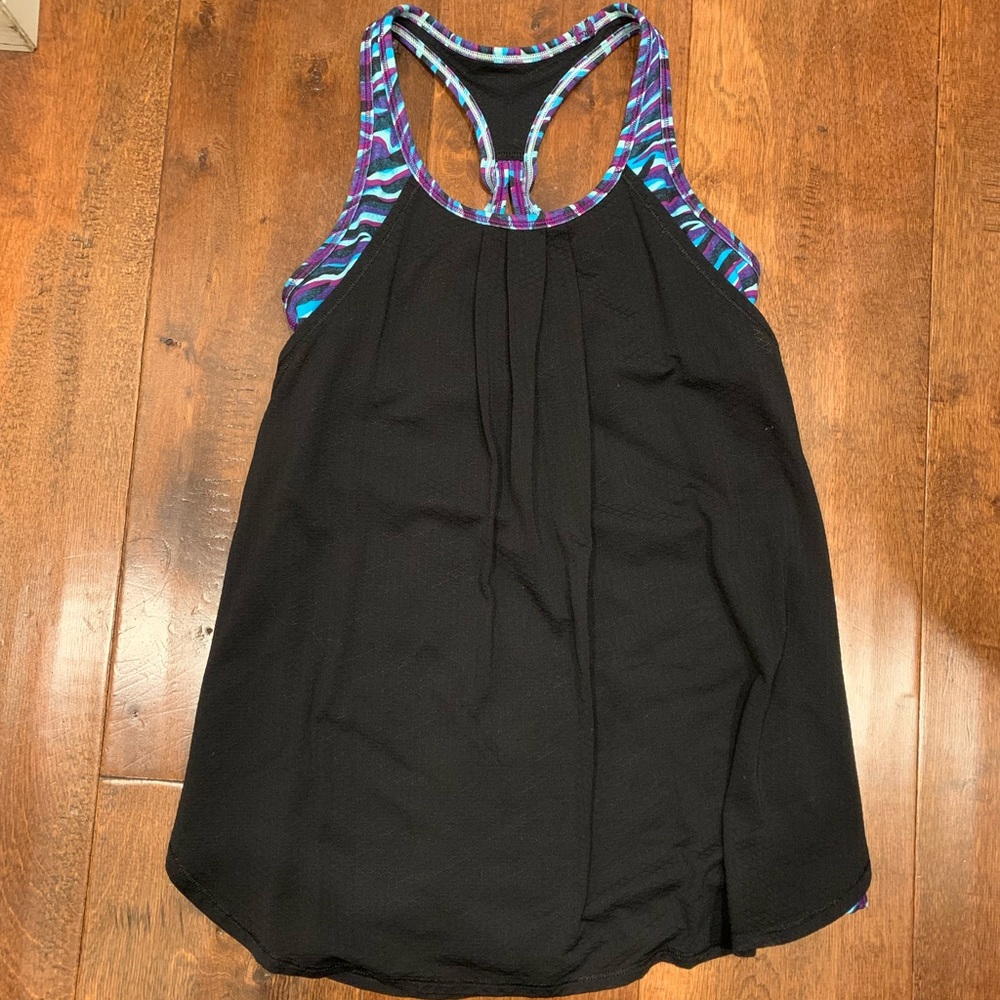 ivivva black, blue, purple, and turquoise colored tank top
